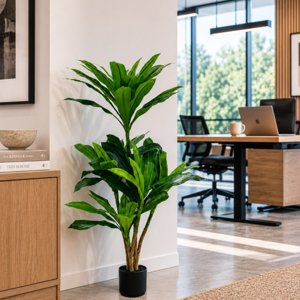 Real touch dracaena tree in black pot styled in a home office corner