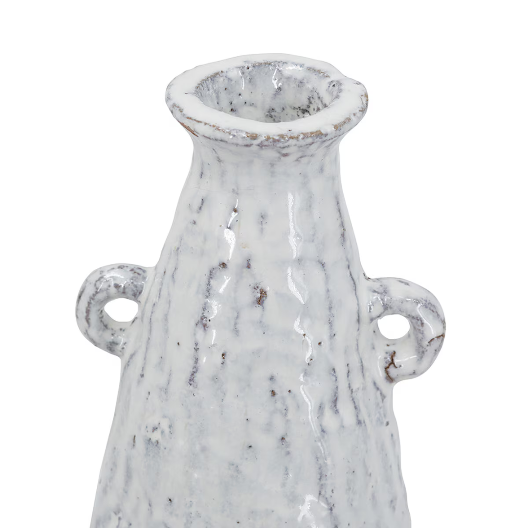 Close-up detail of the neck and decorative loop handles on the Aegean ceramic vase showing mottled white glaze with brown speckled texture and aged finish