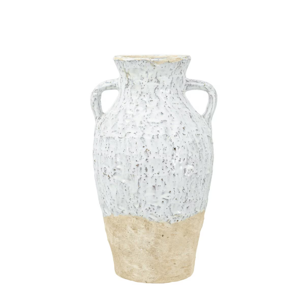 Classic amphora-shaped ceramic vase with two D-shaped handles, rounded body, heavily textured mottled white crackle glaze on upper half and raw sandy terracotta unglazed base, photographed on white background