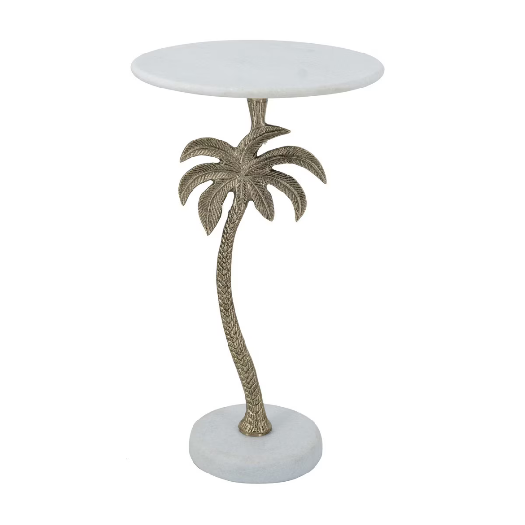 Round marble side table with a unique palm tree base design on the leg