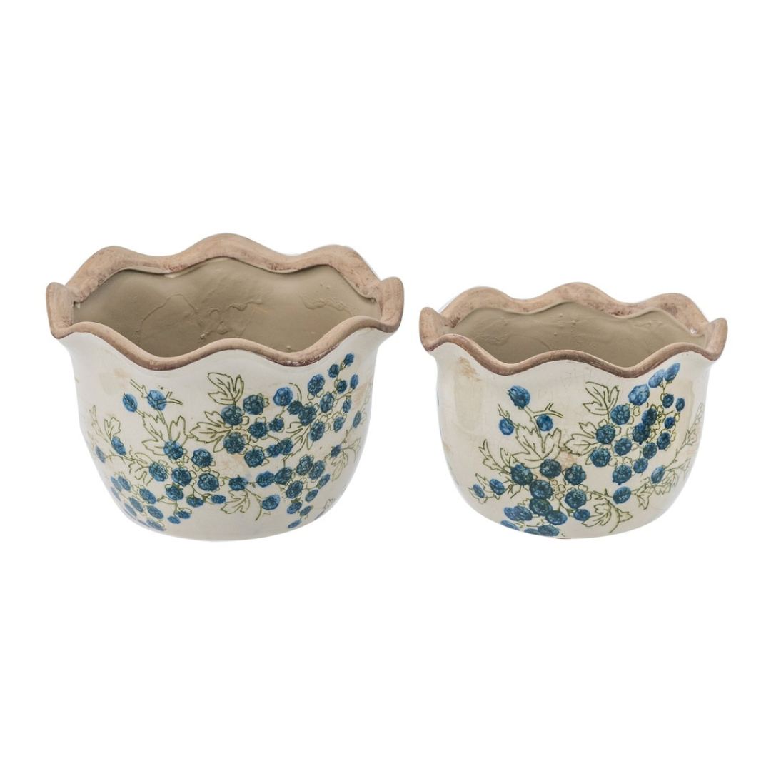Two blueberry ceramic scalloped planters in large and small sizes on white background