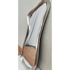 Large silver asymmetric mirror leaning against wall, floor leaning style — Mish Lifestyle NZ